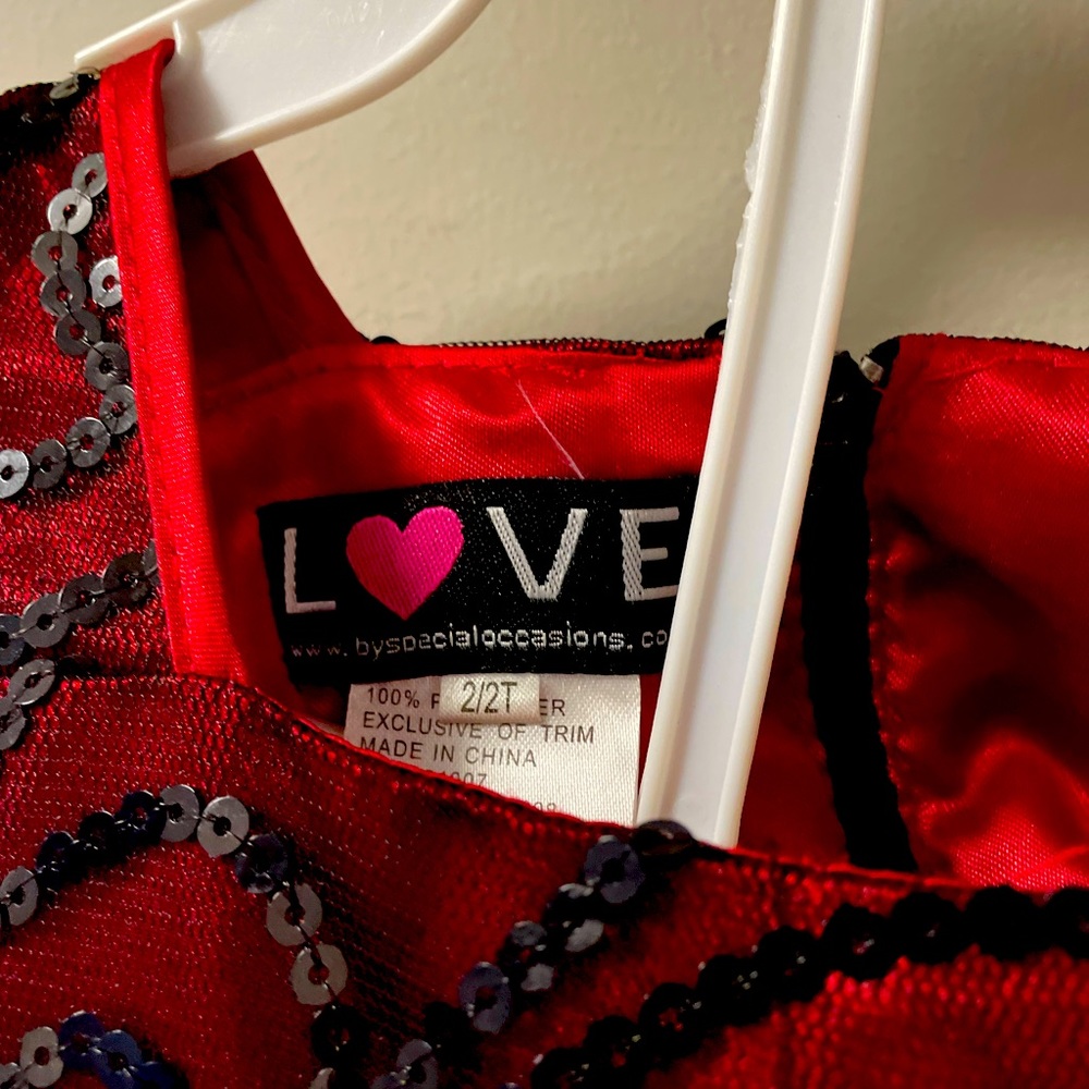 This red dress by love is to die for well made and beautiful